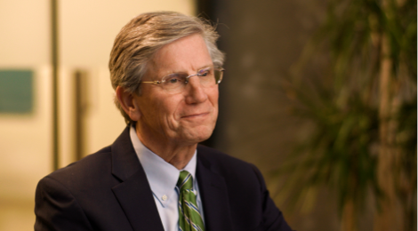 FHLBank Boston President Tim Barrett wearing a suit jacket and tie.