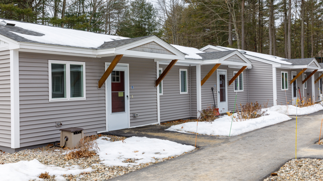 affordable housing complex in Maine with snow on the ground