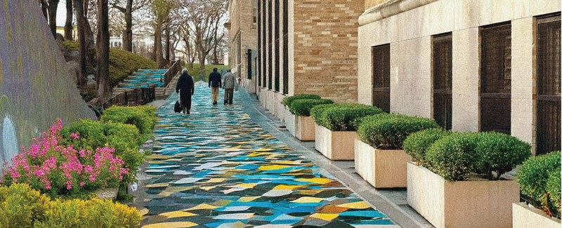exterior of apartment building with colorful landscaping and 3 adults walking down a walkway